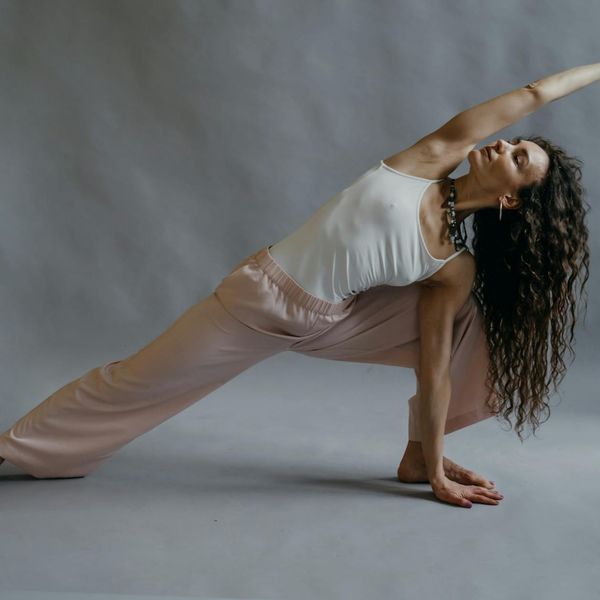 Person demonstrating a precise yoga balance pose.